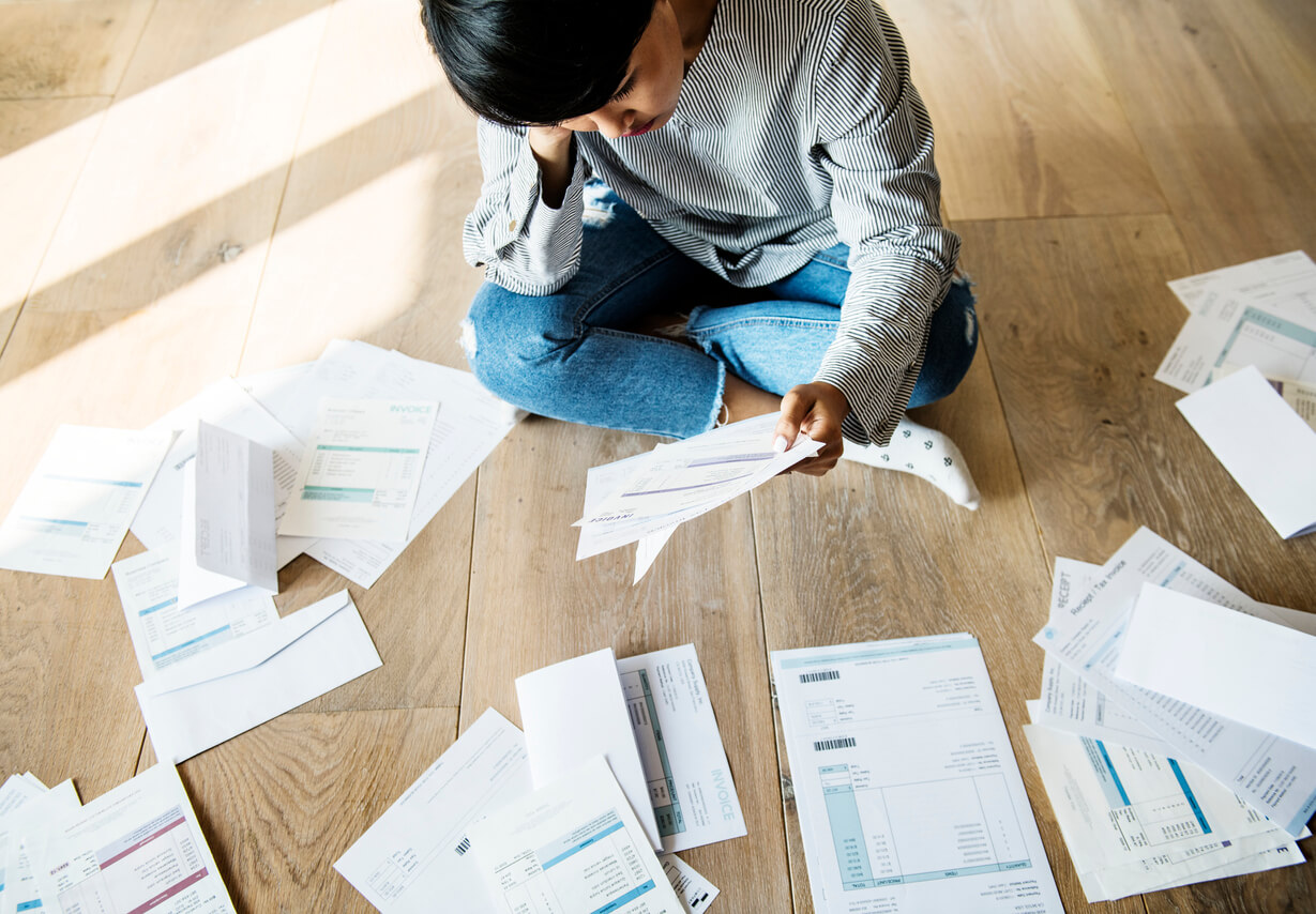 Student sorting bills out