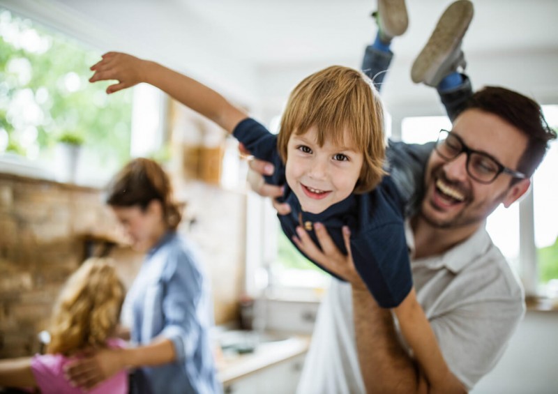 A happy family inside their home