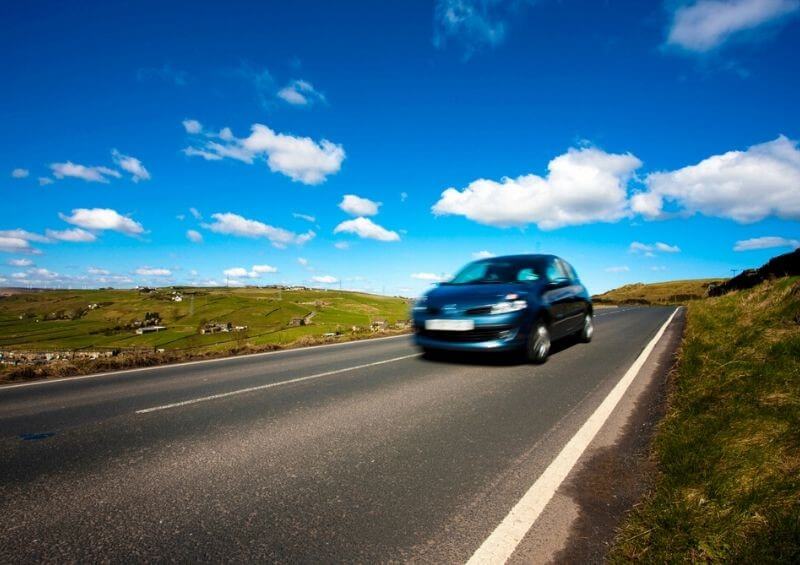 Car driving on a country road