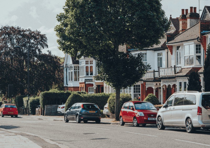 Cars parked on a British street