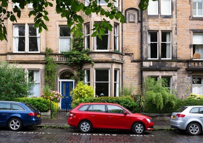 Cars parked outside a house during Coronavirus