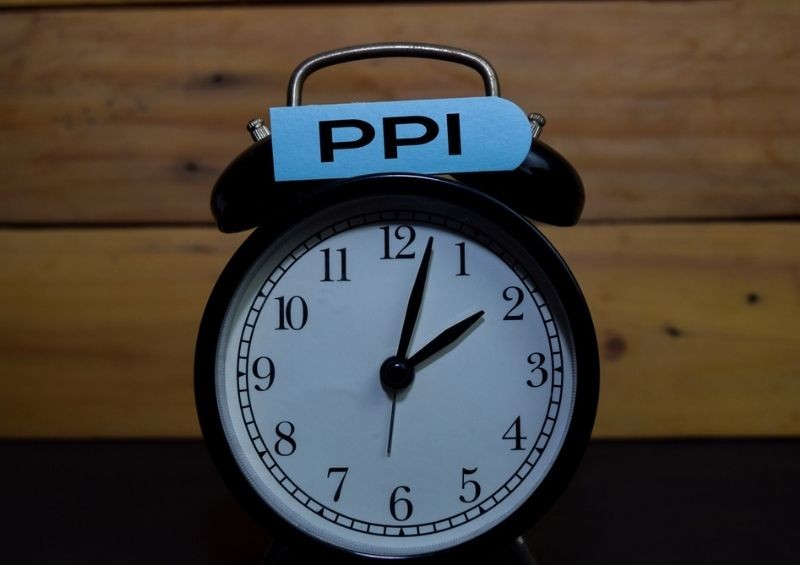 Clock with PPI refund label on it
