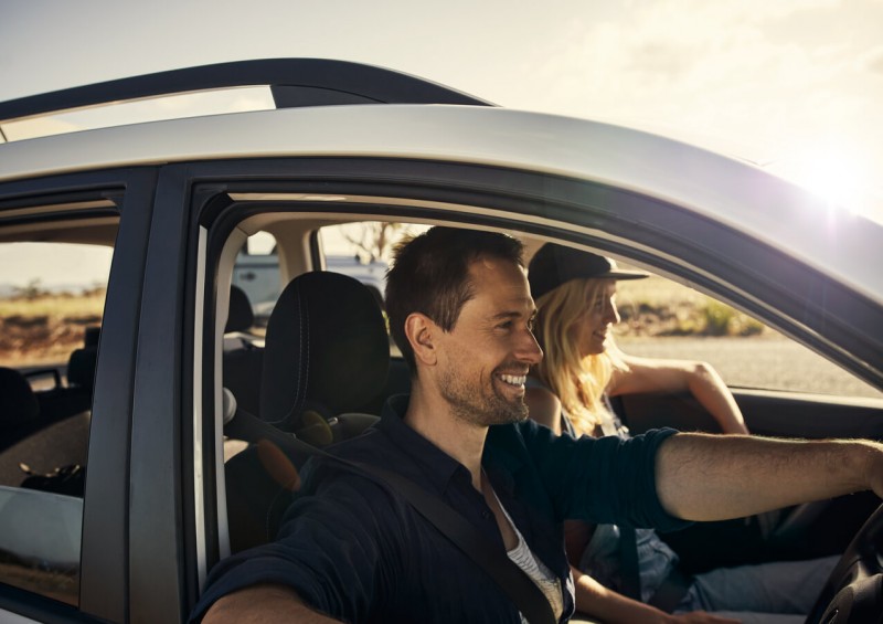 Couple driving in a car