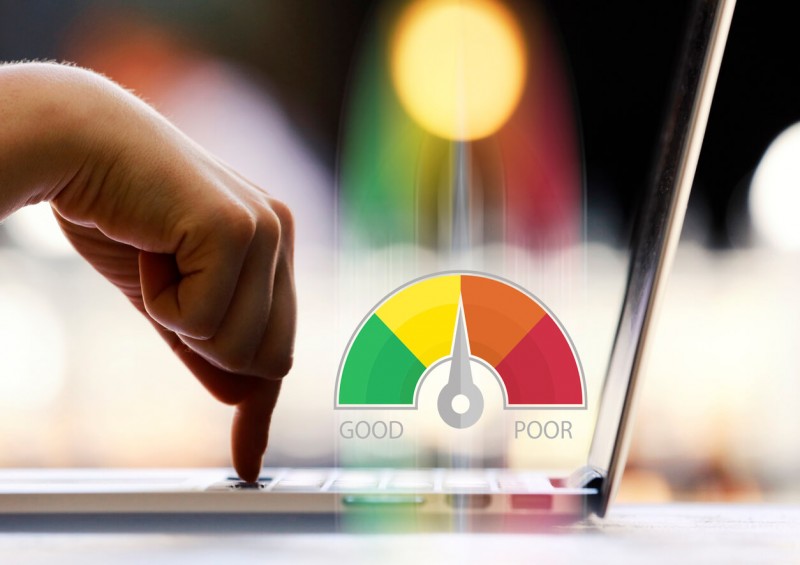 Credit score diagram next to laptop