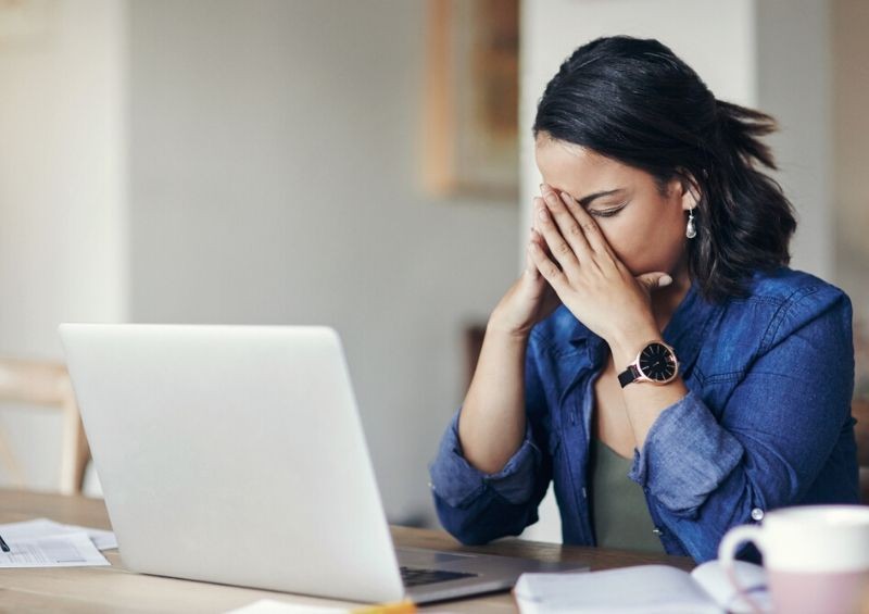 Distressed woman dealing with finances after death