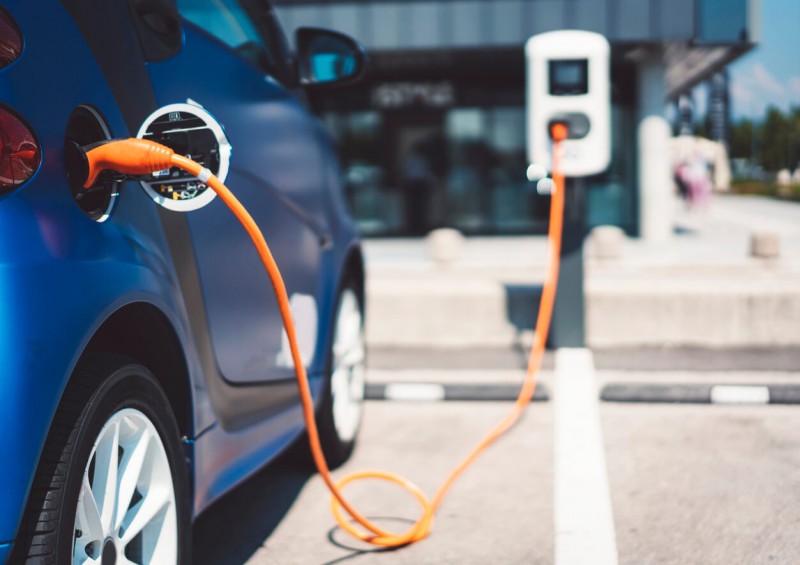 Electric car plugged into a charging point