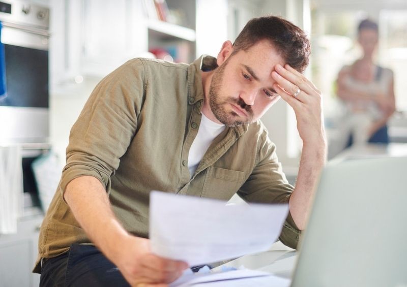Man concerned checking credit score letter