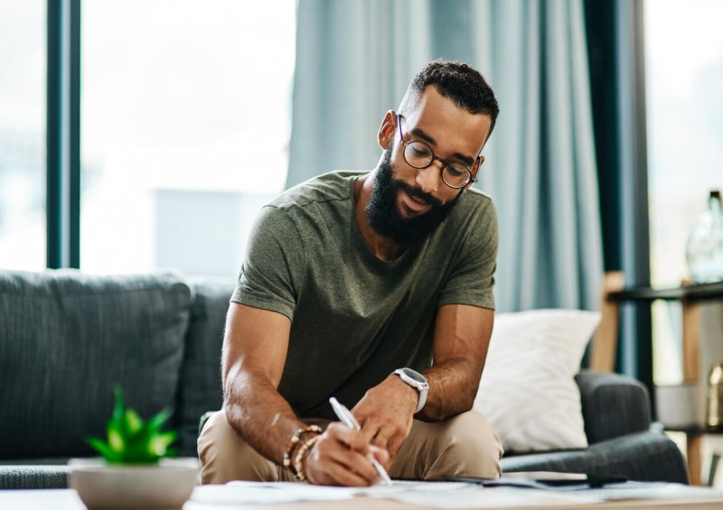 Man signing a will