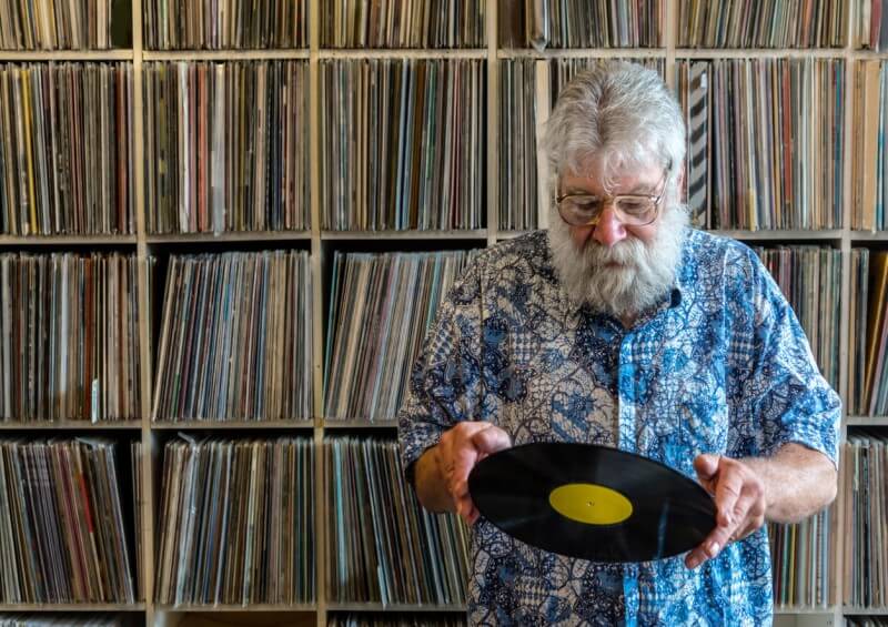 man with old records