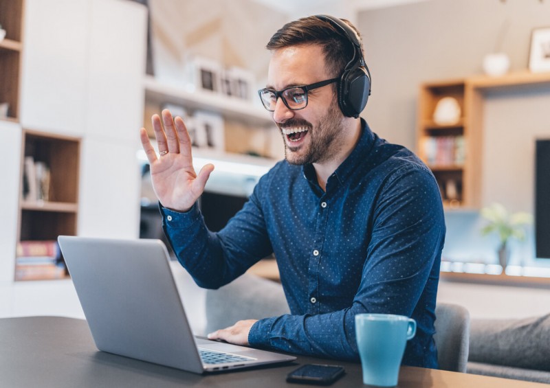 Man working from home with headset on