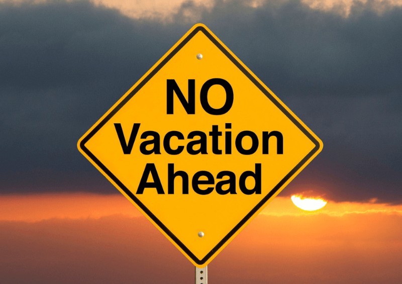 No vacation ahead sign yellow