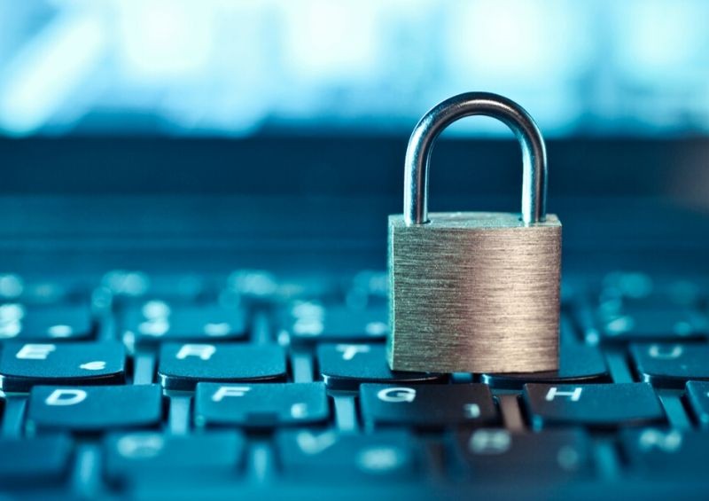 Pad lock on top of a laptop keyboard