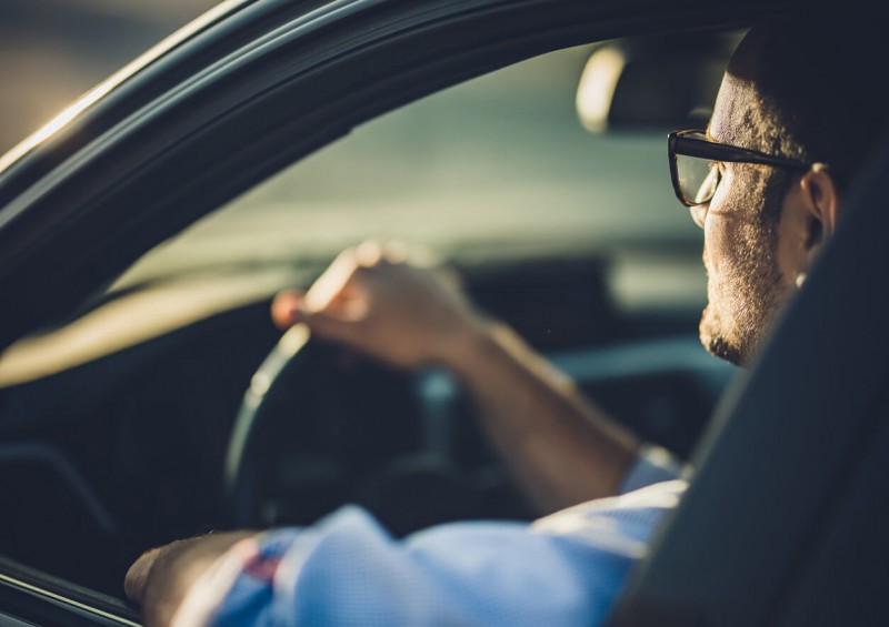 Person driving a car