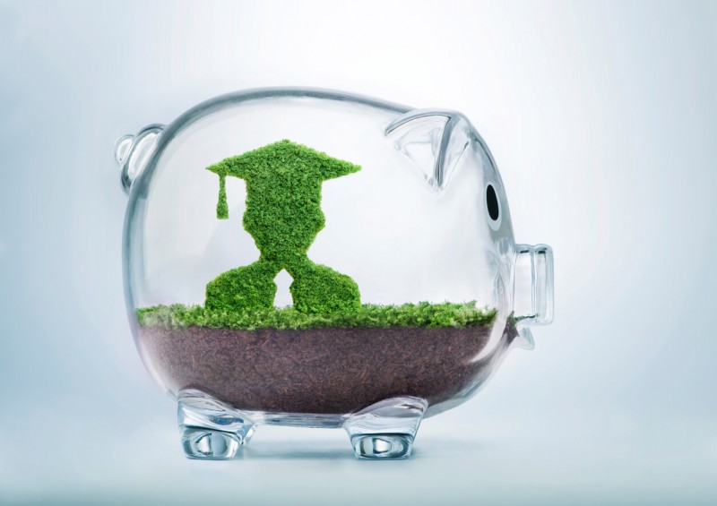 Piggy Bank with graduate or student inside