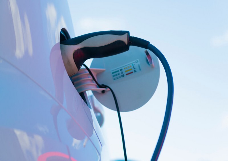 Plug charging electric vehicle