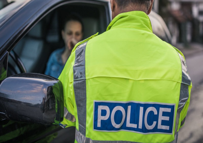 Policeman talking to a driver