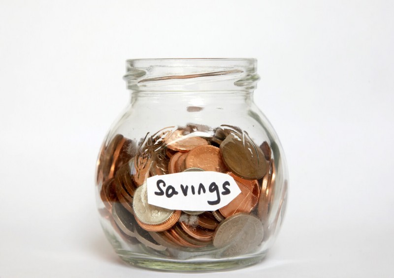 Savings jar with coins
