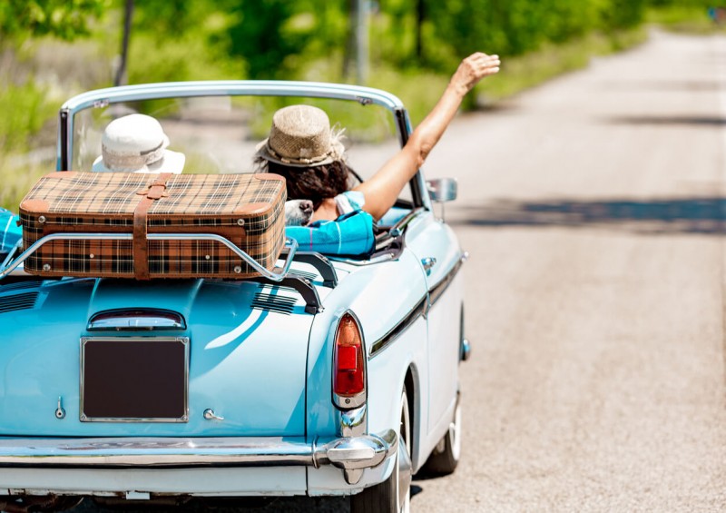 Specialist classic car driving in summer