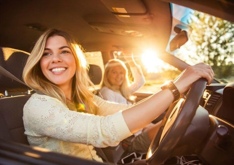 Teenager driving with mum in the car