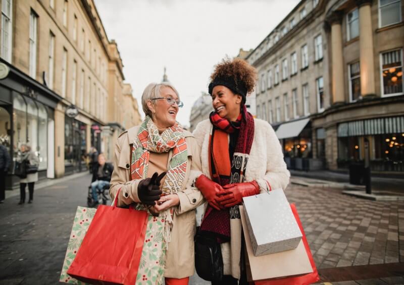 Two ladies Christmas shopping together