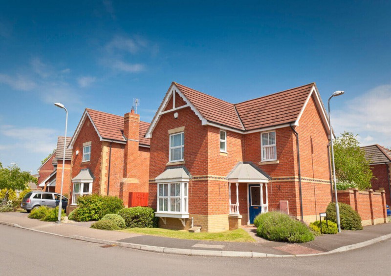 Two large UK houses next to each other