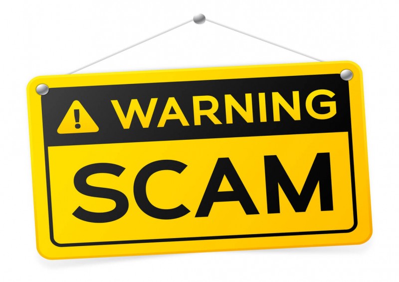Warning scam sign