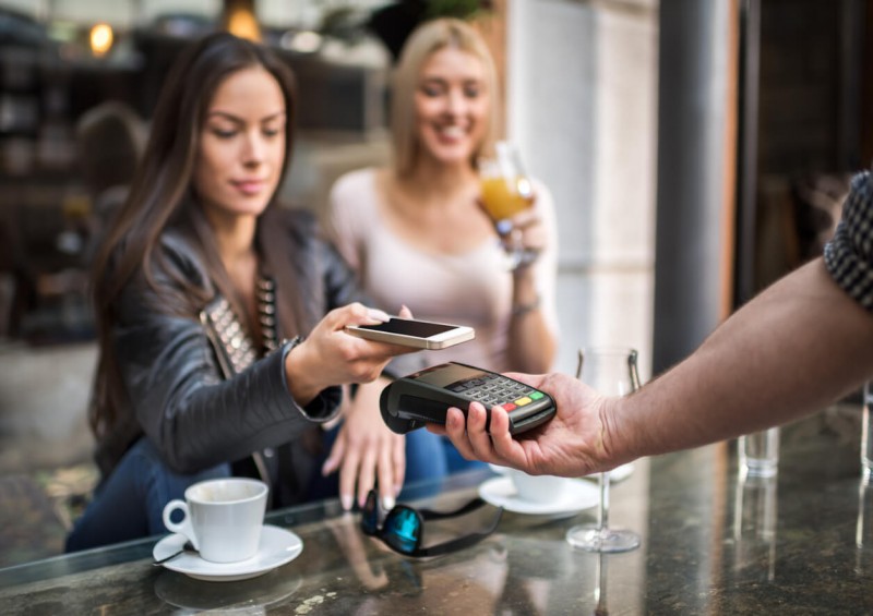 woman using apple pay
