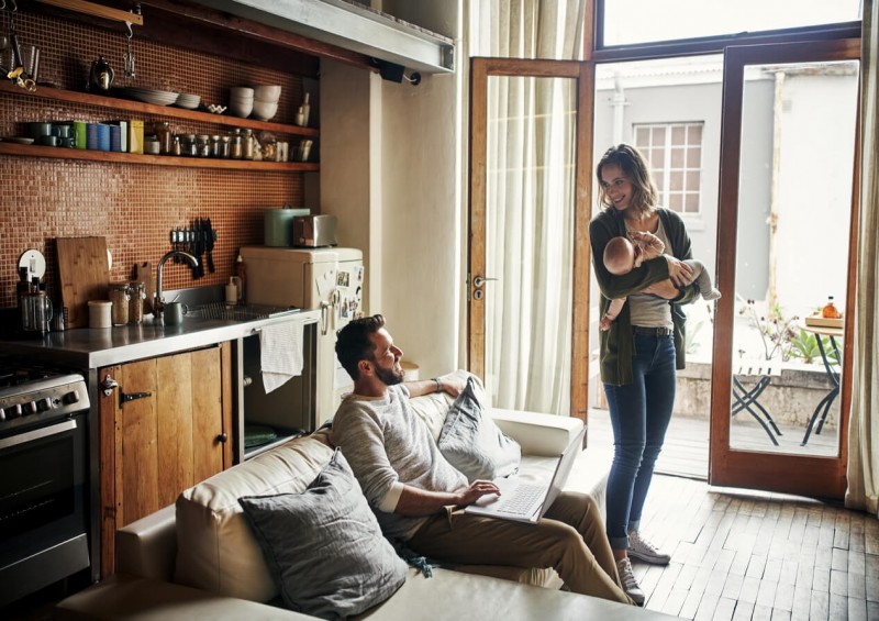 Young couple discuss wills in their flat