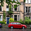 Cars parked outside a house during Coronavirus