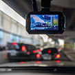 Dash cam on the windscreen of a car