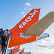 Easyjet customers boarding plane