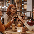 Friends enjoying a glass of coke