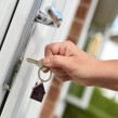 Opening front door to house