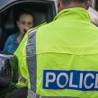 Policeman talking to a driver