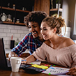 Young couple researching loans